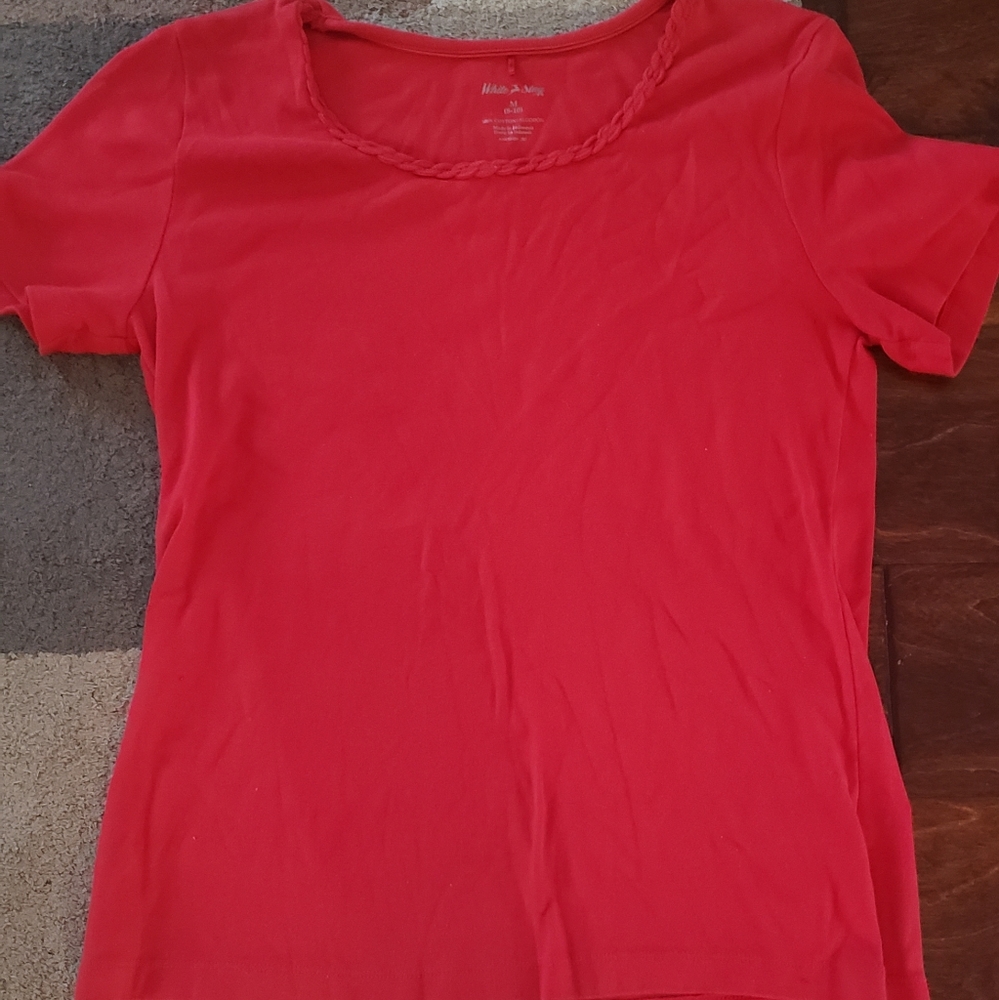 Top with raised neckline braid